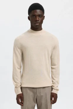 Camisola de gola falsa 100% lã merino.