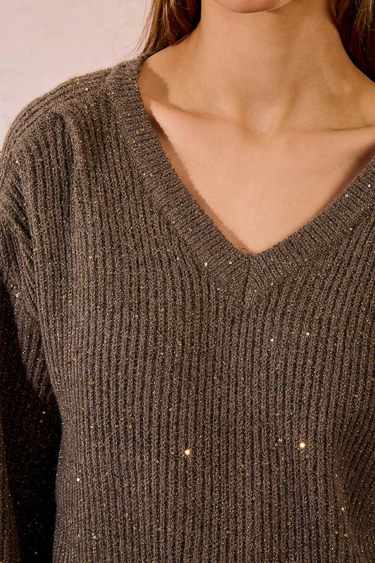 Camisola de manga comprida com detalhe de miçangas