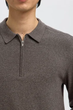 Camisola polo 100% algodão com meia fecho-éclair .