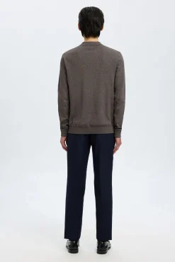 Camisola polo 100% algodão com meia fecho-éclair .