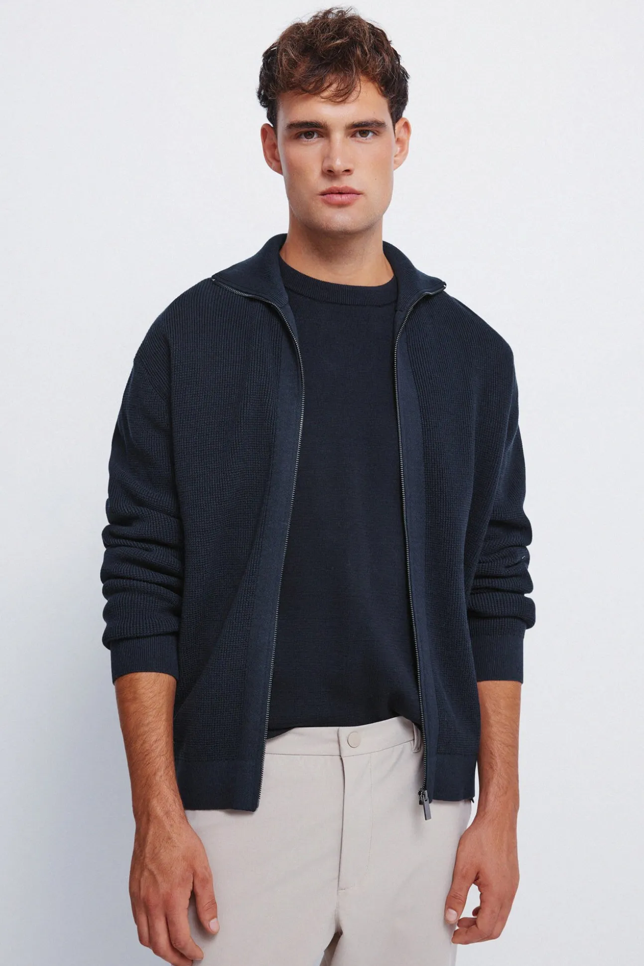 Cardigan com casaco de malha