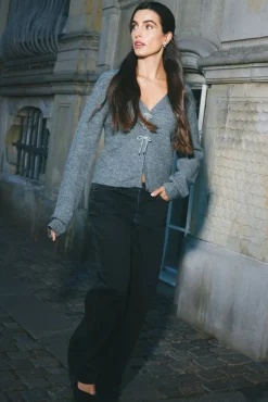 Cardigan com laços brilhantes