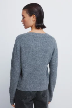 Cardigan com laços brilhantes