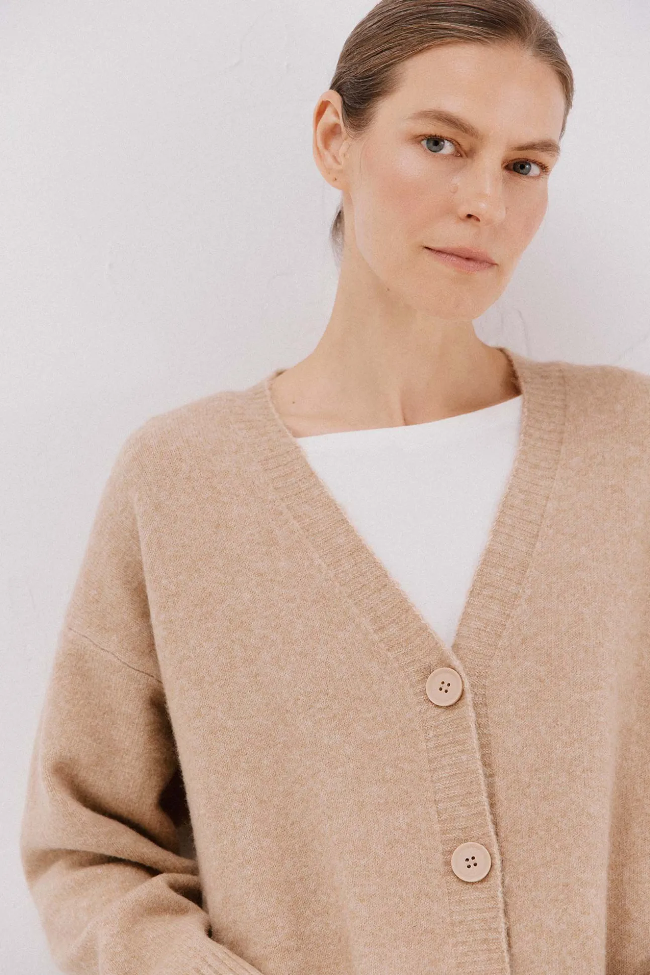Cardigan longo com bolsos