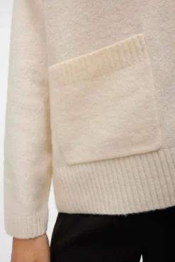 Casaco de malha com bolsos