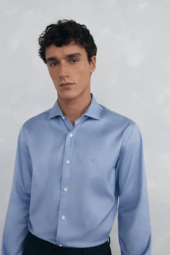 Conjunto de calças e camisa