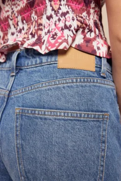 Jeans de botões largos