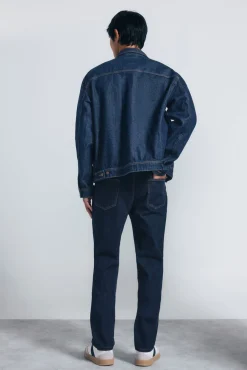 Jeans slim fit desbotado