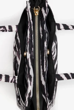 Mala acolchoada com estampado de zebra
