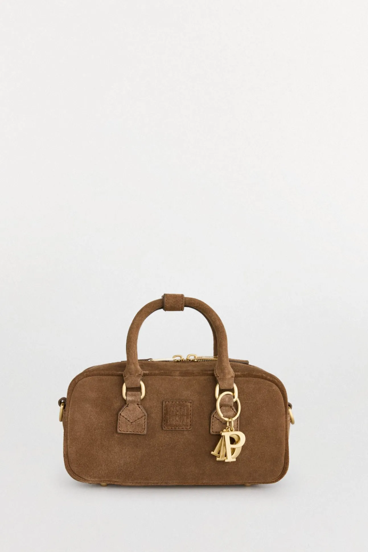 mini bolsa de boliche com mala de tiracolo de pele