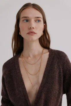 Nicoletta. Camisola com nó