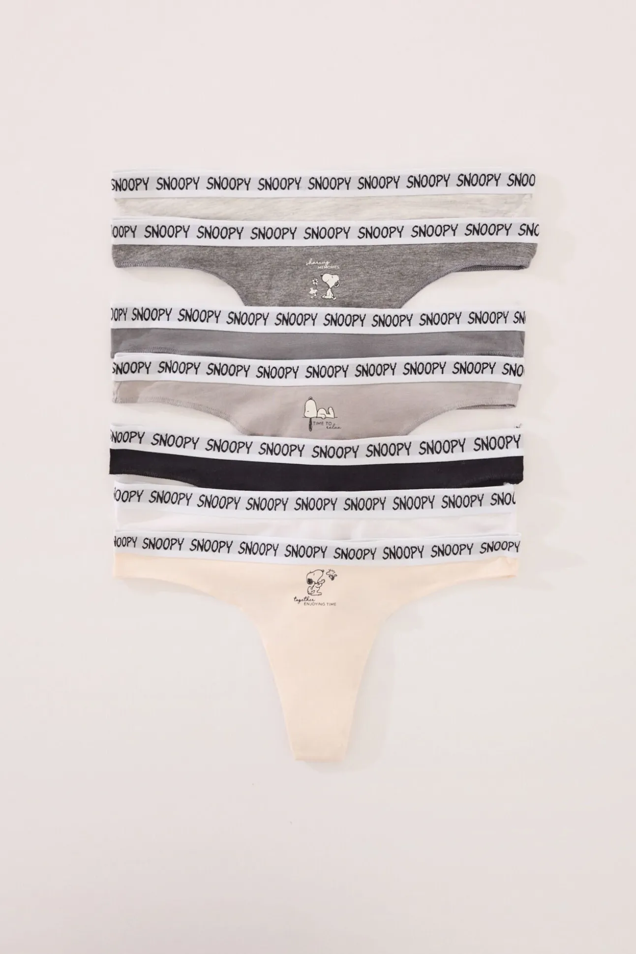 Pacote com 7 tangas de algodão multicoloridas do Snoopy