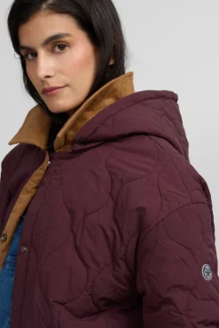 Parka longa acolchoada com detalhes de veludo cotelê