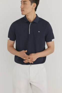 Polo com punhos contrastantes