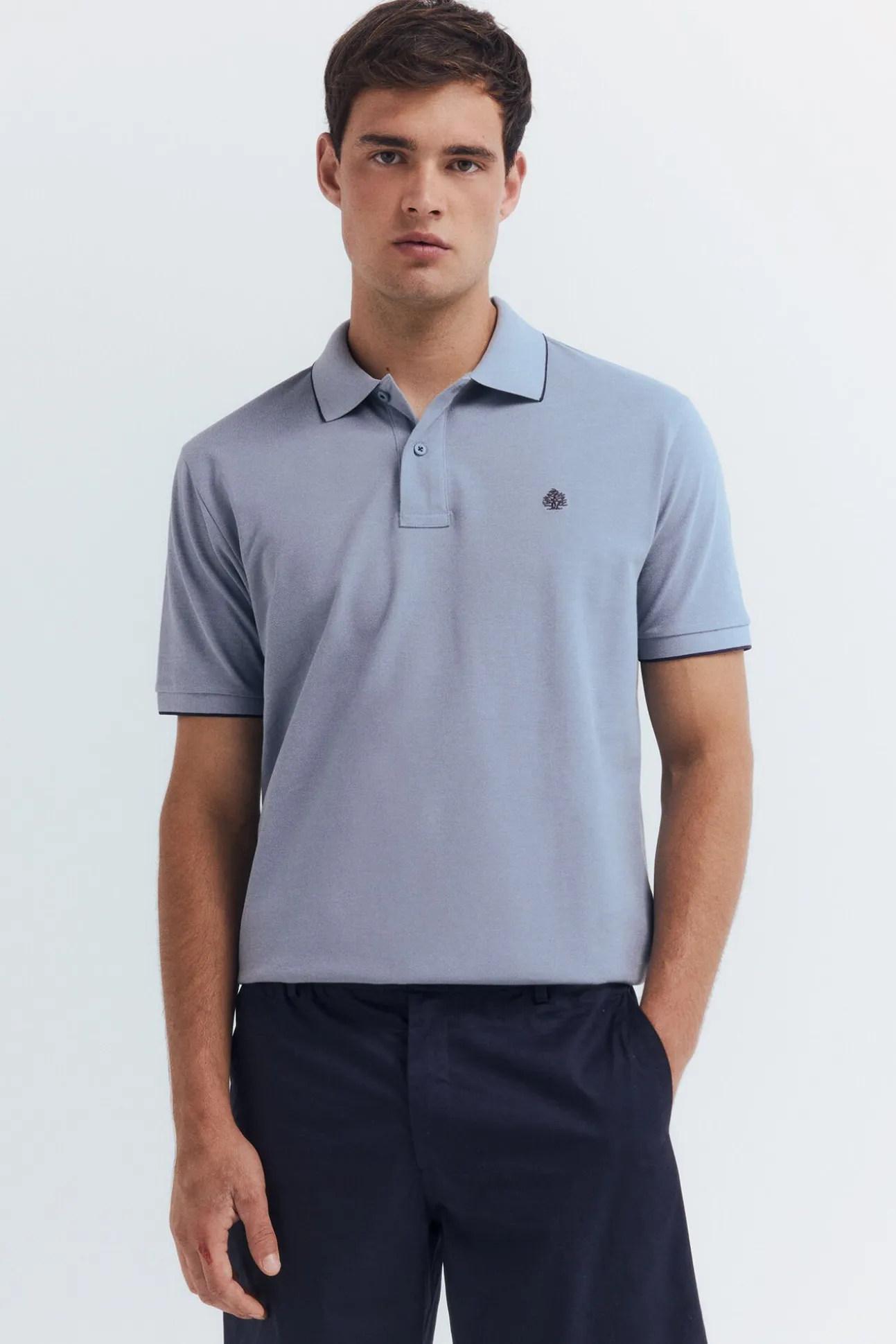 Polo piqué chique com gola canelada de corte regular