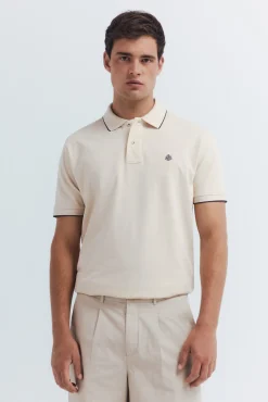 Polo piqué chique com gola canelada de corte regular