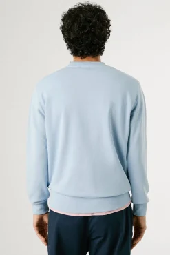 Sweatshirt com gola redonda , logo e estampado.