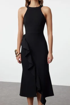 Vestido com folhos